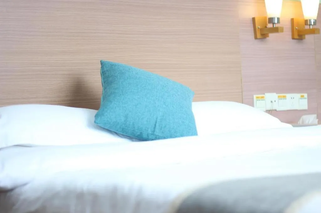 Bed in Yian Business Hotel