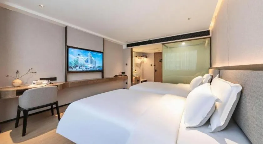 Bed in Yian Business Hotel