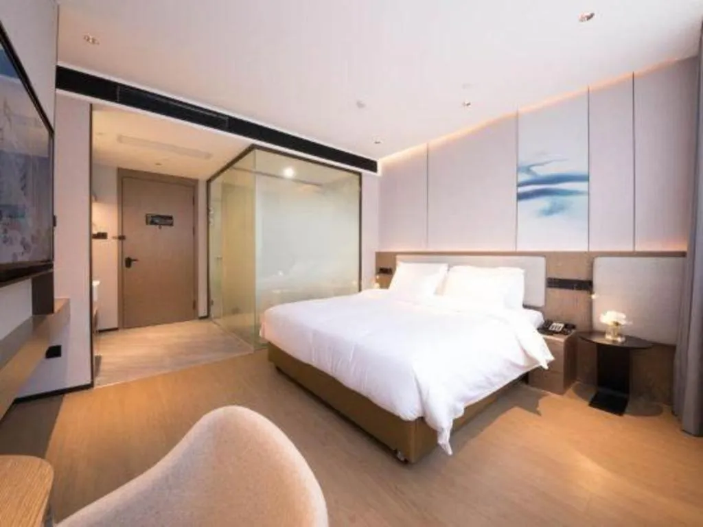 Bed in Yian Business Hotel