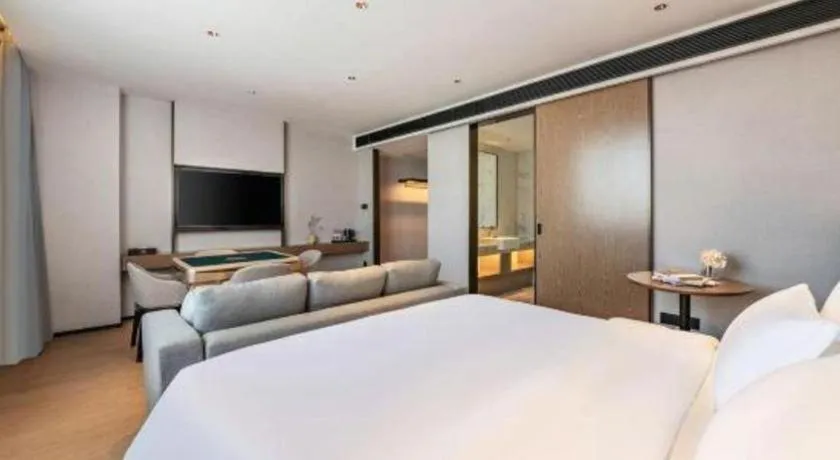 Bed in Yian Business Hotel