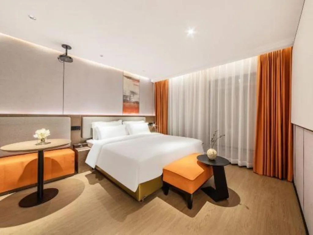 Bed in Yian Business Hotel