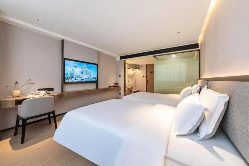 Bed in Yian Business Hotel