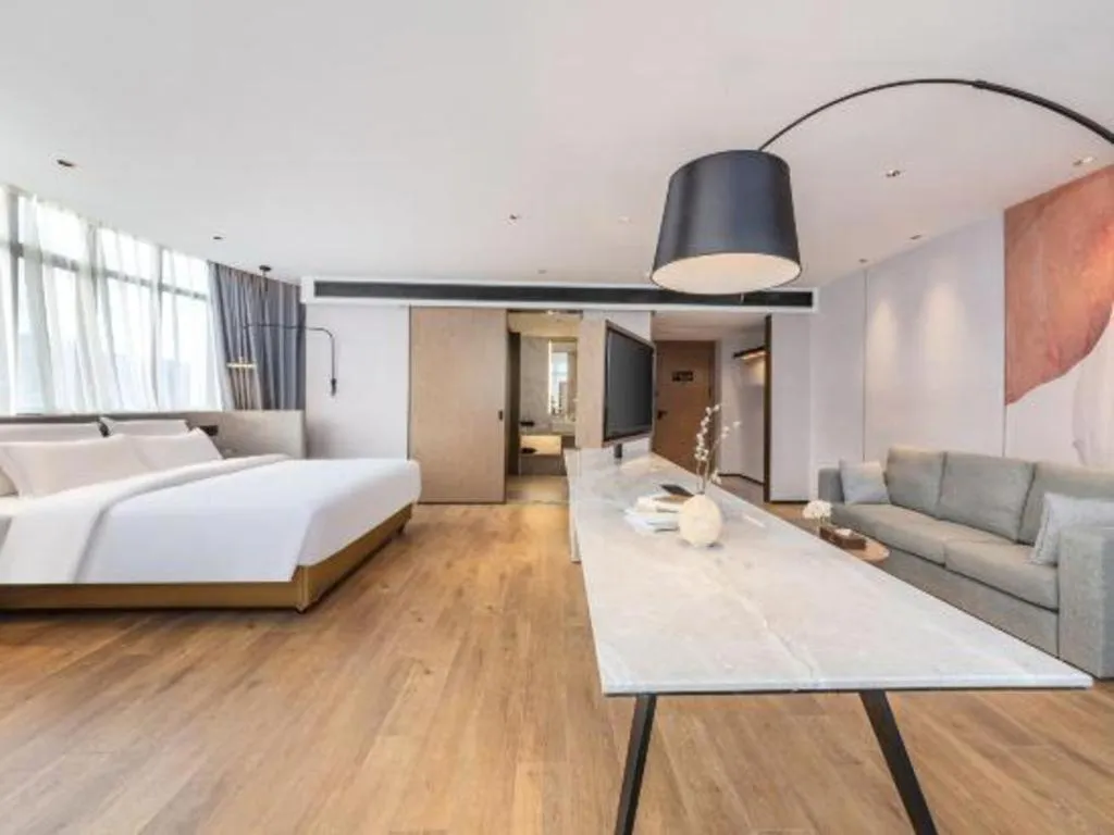 Bed in Yian Business Hotel