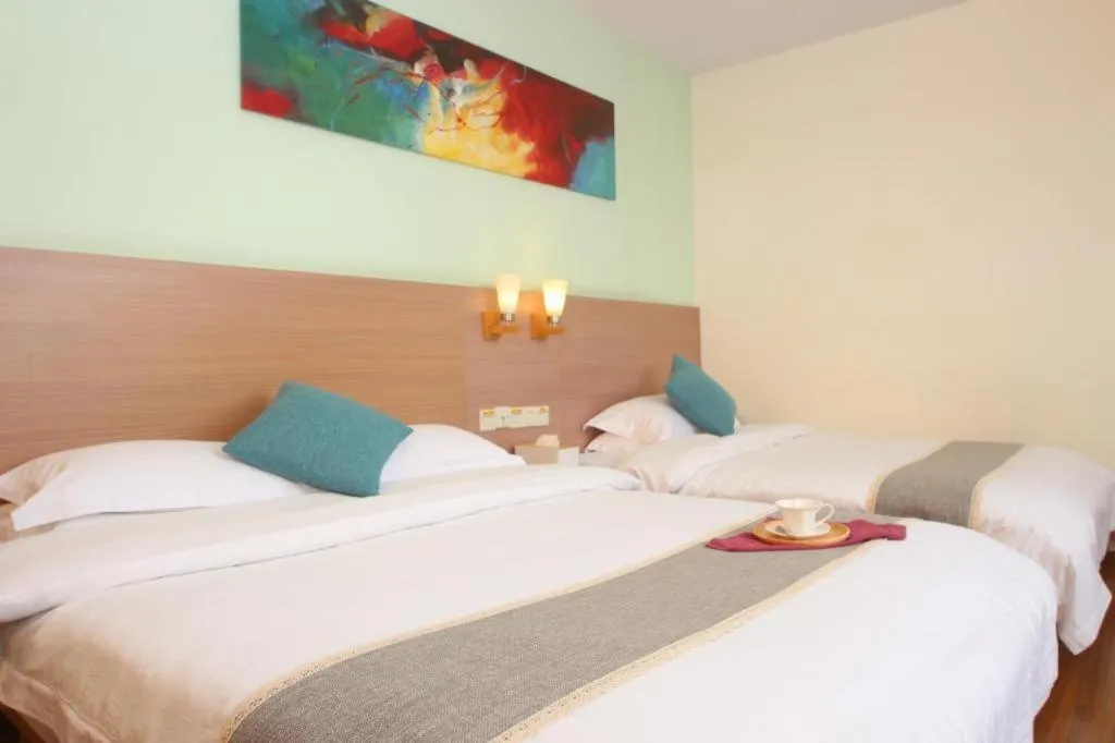 Bed in Yian Business Hotel