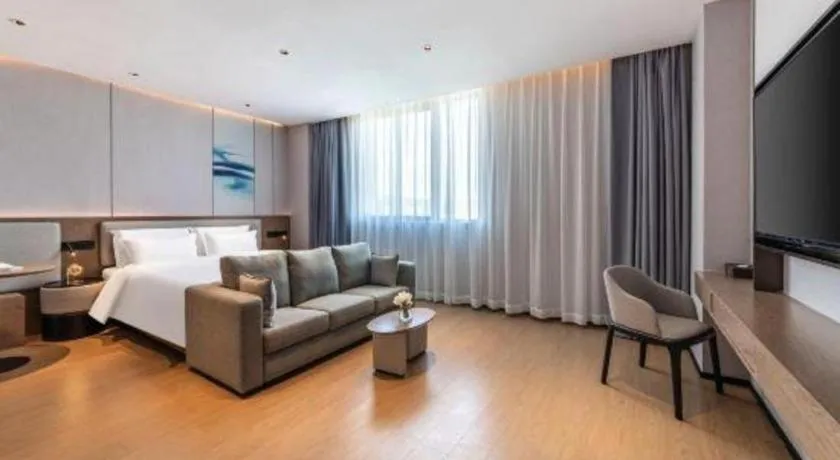 Bed in Yian Business Hotel