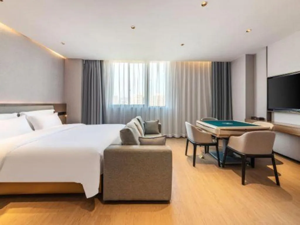 Bed in Yian Business Hotel