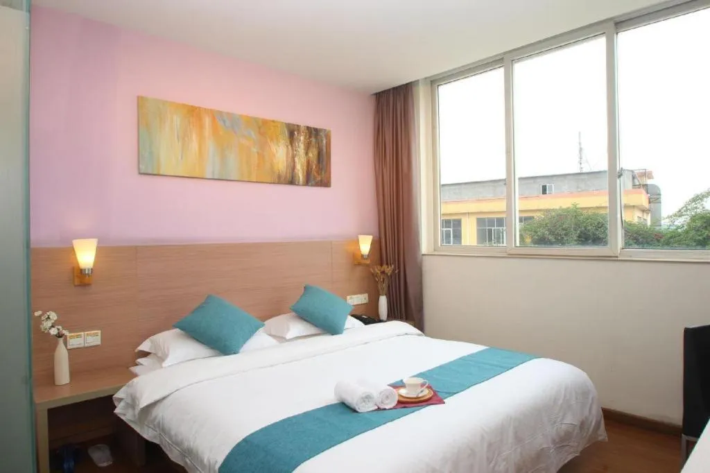 Bed in Yian Business Hotel