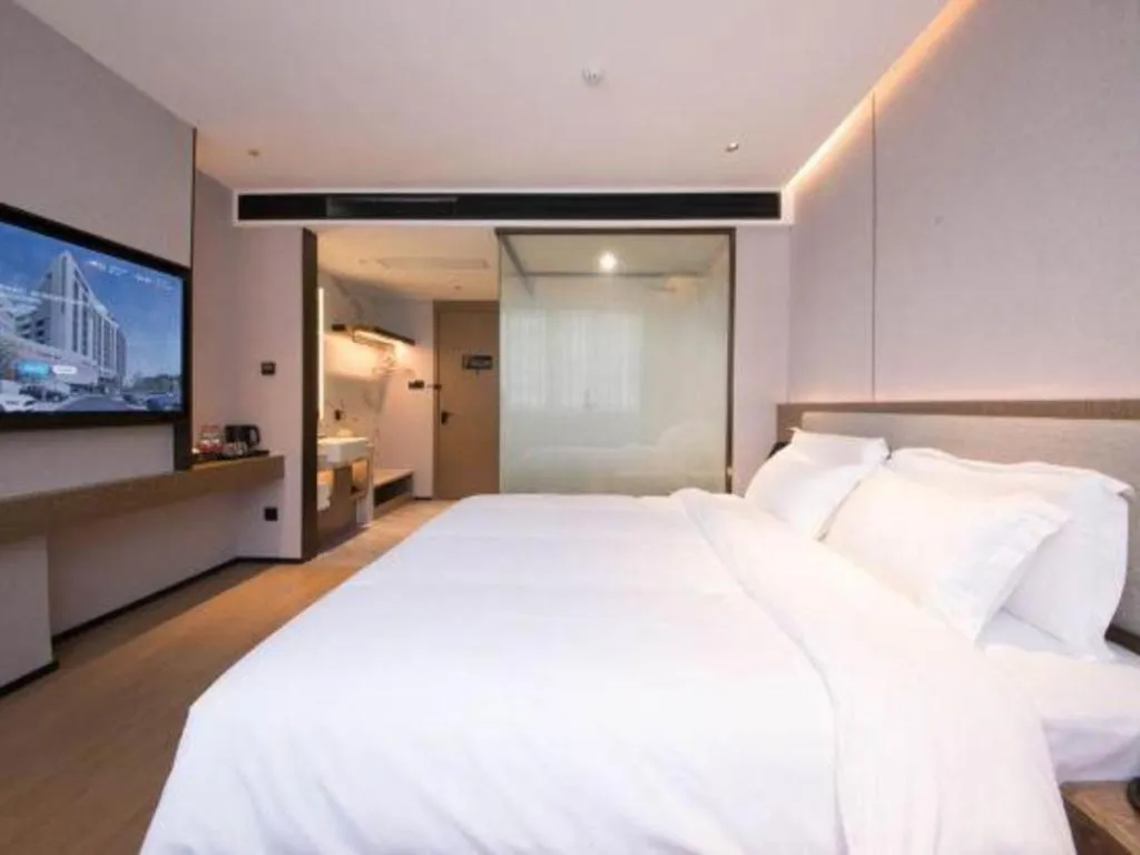 Bed in Yian Business Hotel