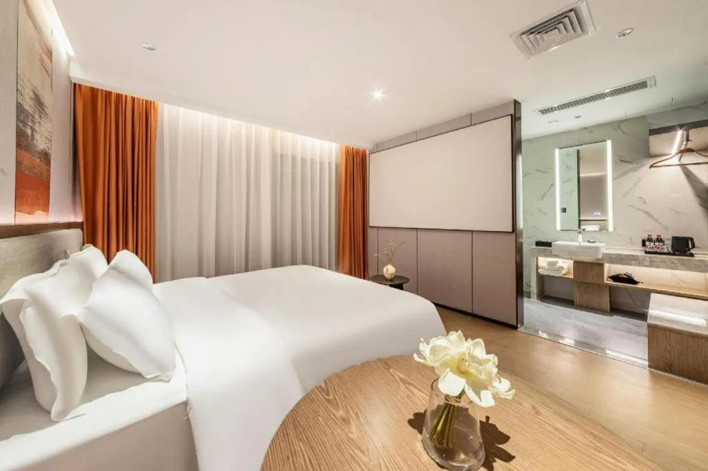 Bed in Yian Business Hotel