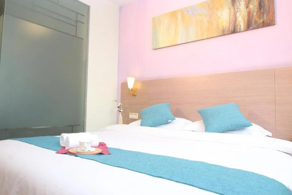 Bed in Yian Business Hotel