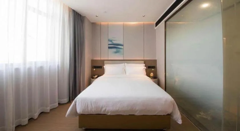 Bed in Yian Business Hotel