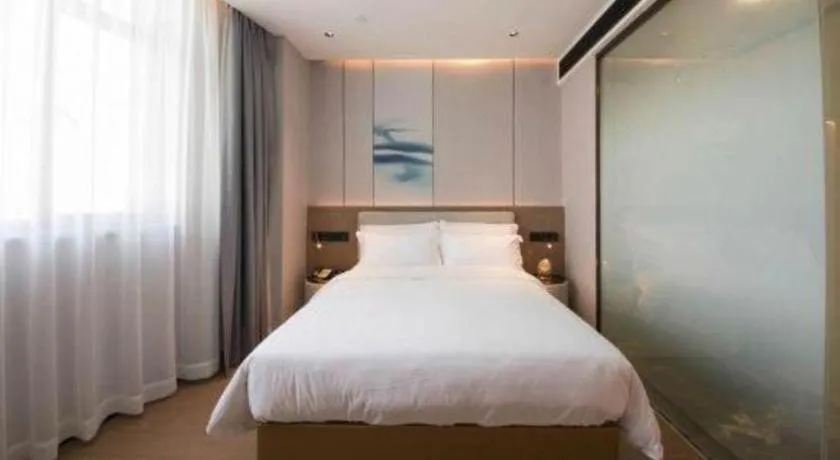 Bed in Yian Business Hotel