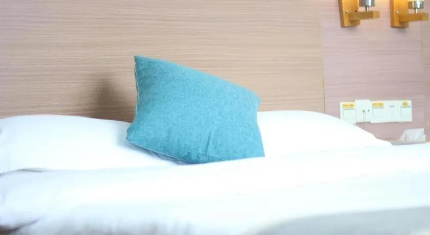 Bed in Yian Business Hotel