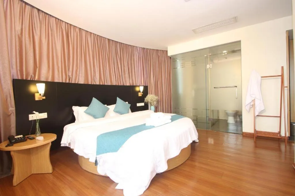 Bed in Yian Business Hotel