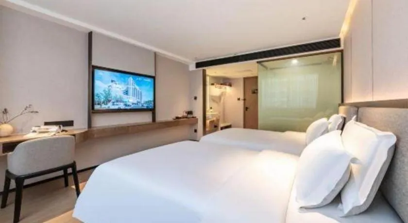 Bed in Yian Business Hotel