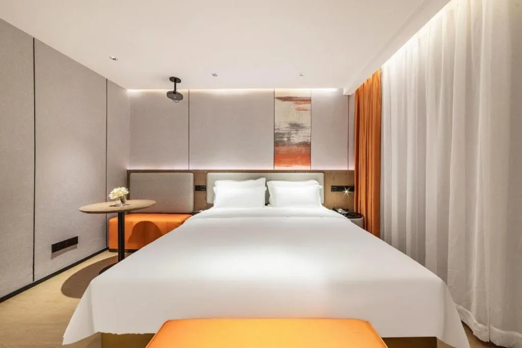 Bed in Yian Business Hotel