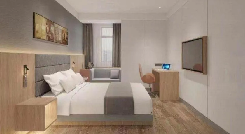 Bed in Jinjiang Inn Wuxi Liangqing Road Wanda Plaza Yunhe Bay Industrial Center