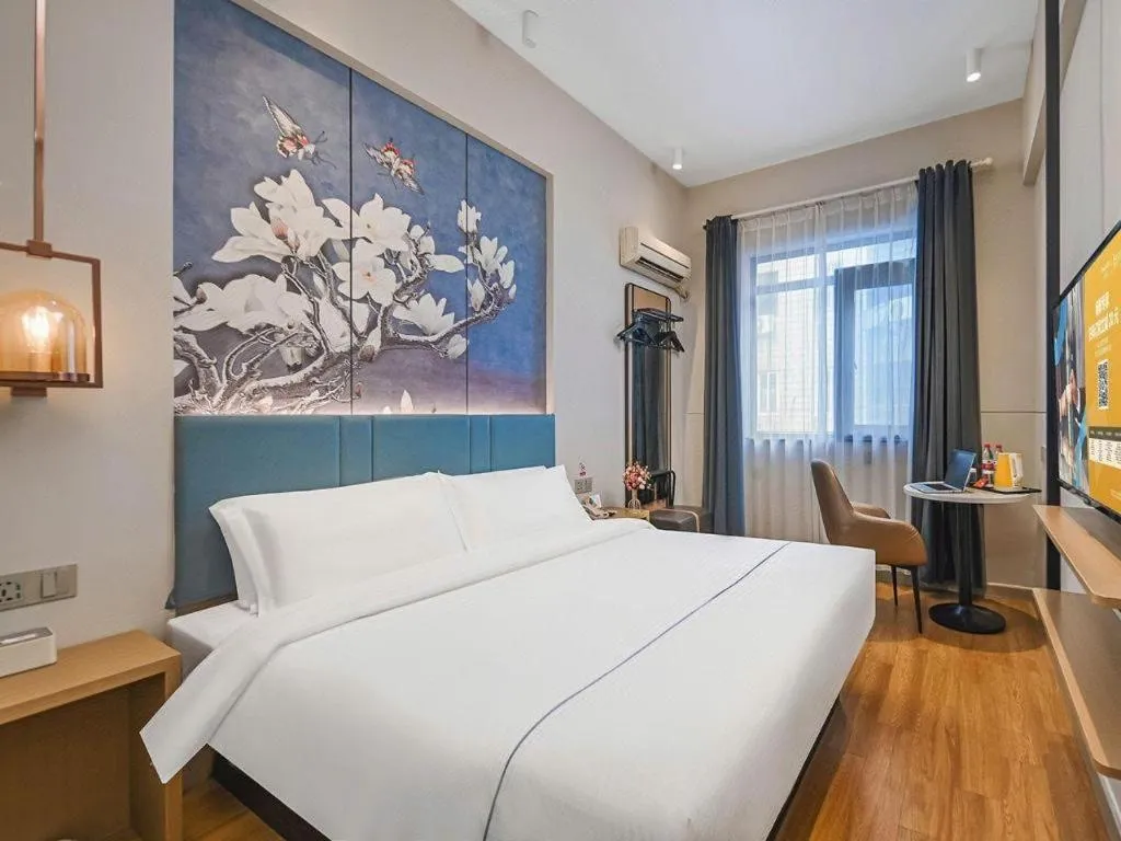 Bed in Jinjiang Inn Wuxi Liangqing Road Wanda Plaza Yunhe Bay Industrial Center