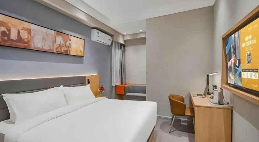 Bed in Jinjiang Inn Wuxi Liangqing Road Wanda Plaza Yunhe Bay Industrial Center