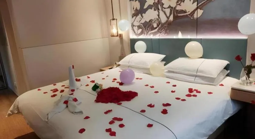 Bed in Jinjiang Inn Wuxi Liangqing Road Wanda Plaza Yunhe Bay Industrial Center