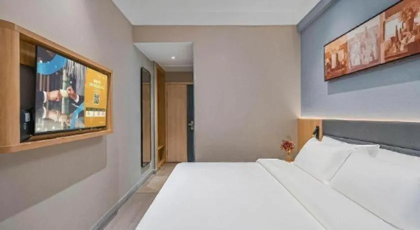 Bed in Jinjiang Inn Wuxi Liangqing Road Wanda Plaza Yunhe Bay Industrial Center