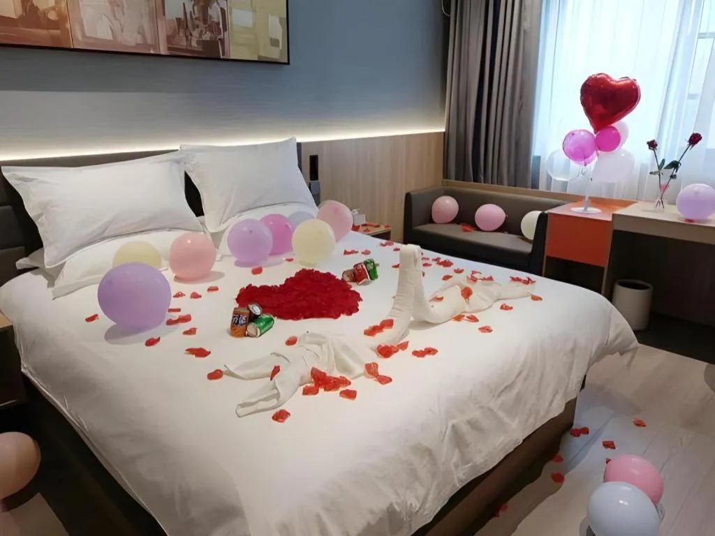 Bed in Jinjiang Inn Wuxi Liangqing Road Wanda Plaza Yunhe Bay Industrial Center