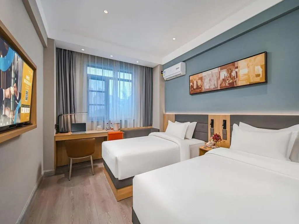 Bed in Jinjiang Inn Wuxi Liangqing Road Wanda Plaza Yunhe Bay Industrial Center