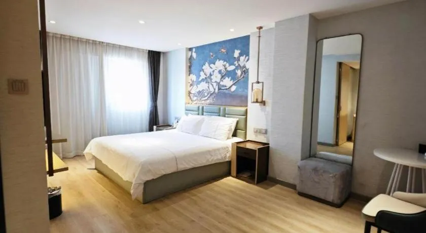 Bed in Magnotel Hotel Suzhou Shiquan Street Wangshiyuan