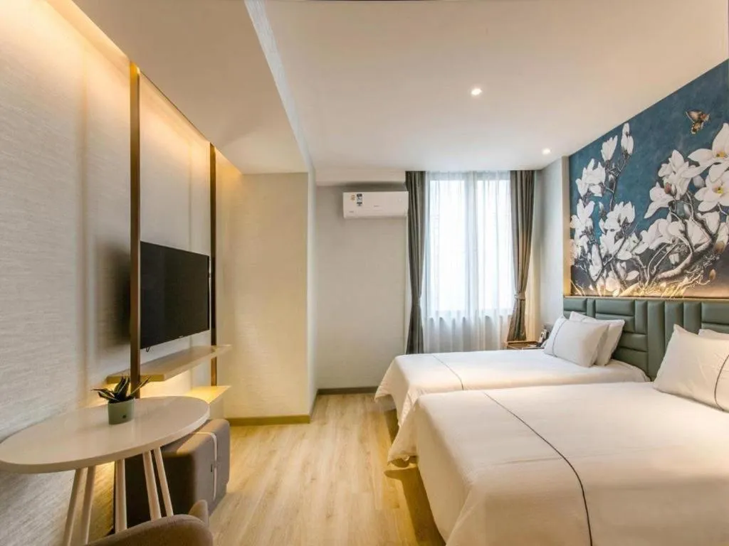 Bed in Magnotel Hotel Suzhou Shiquan Street Wangshiyuan