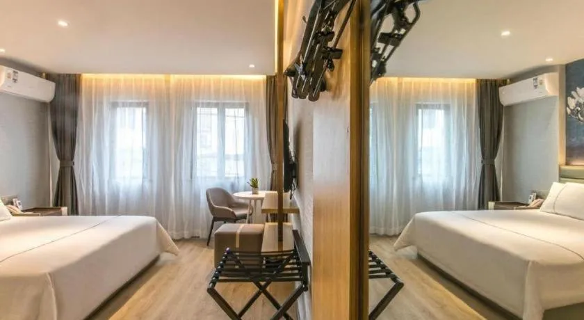 Bed in Magnotel Hotel Suzhou Shiquan Street Wangshiyuan