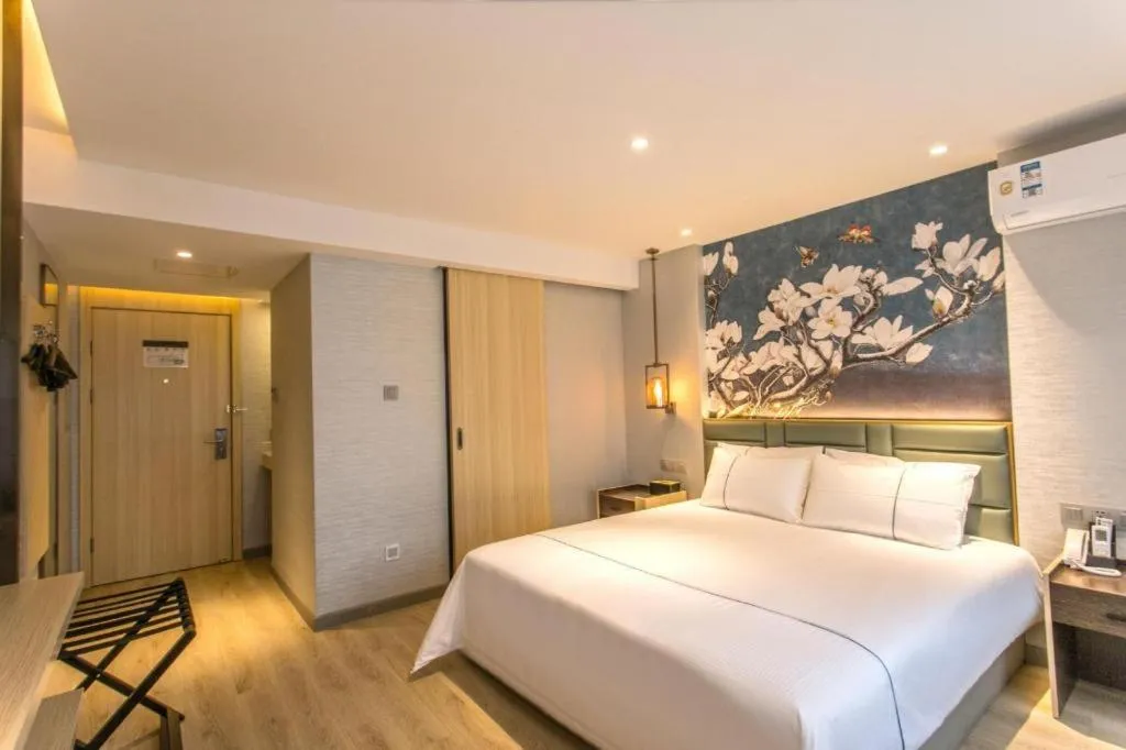 Bed in Magnotel Hotel Suzhou Shiquan Street Wangshiyuan