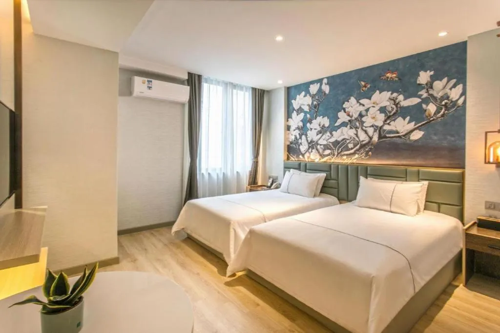 Bed in Magnotel Hotel Suzhou Shiquan Street Wangshiyuan