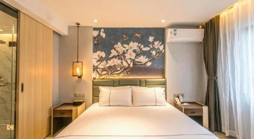 Bed in Magnotel Hotel Suzhou Shiquan Street Wangshiyuan