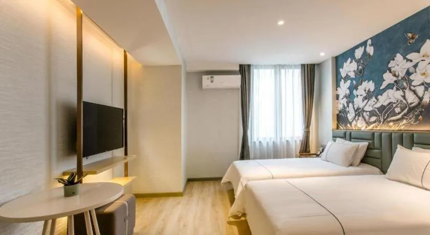 Bed in Magnotel Hotel Suzhou Shiquan Street Wangshiyuan