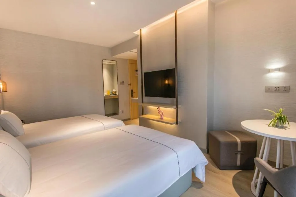 Bed in Magnotel Hotel Suzhou Shiquan Street Wangshiyuan