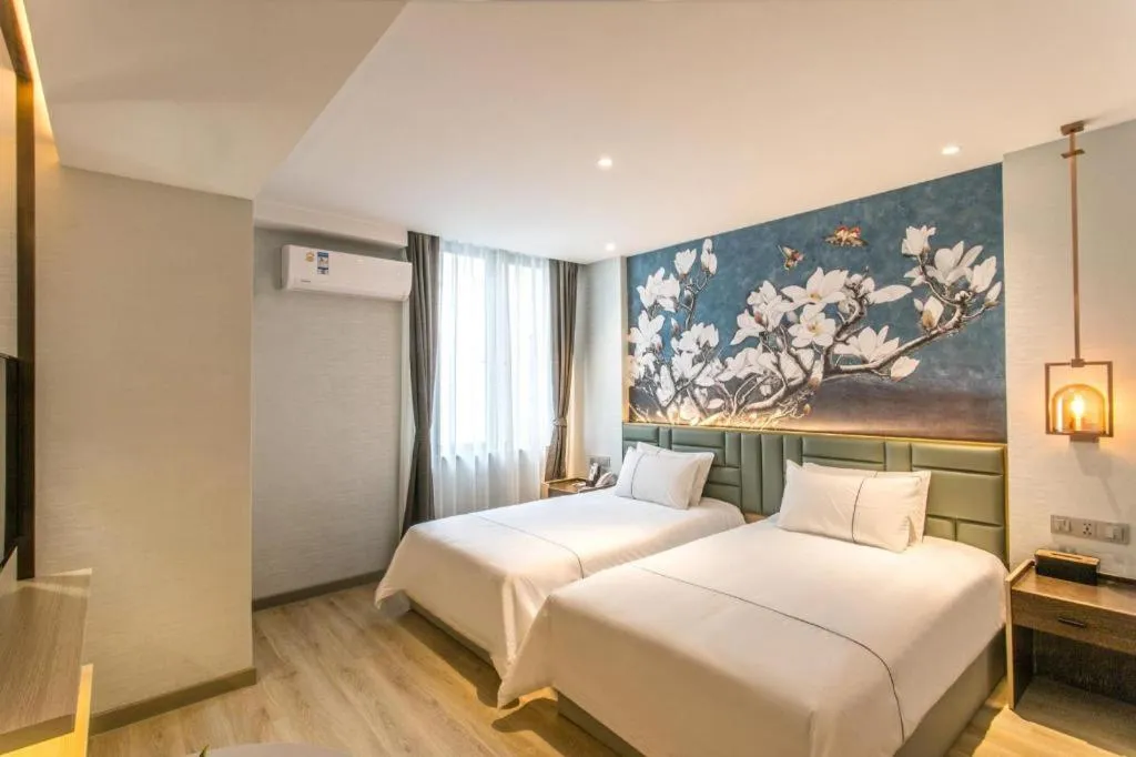 Bed in Magnotel Hotel Suzhou Shiquan Street Wangshiyuan