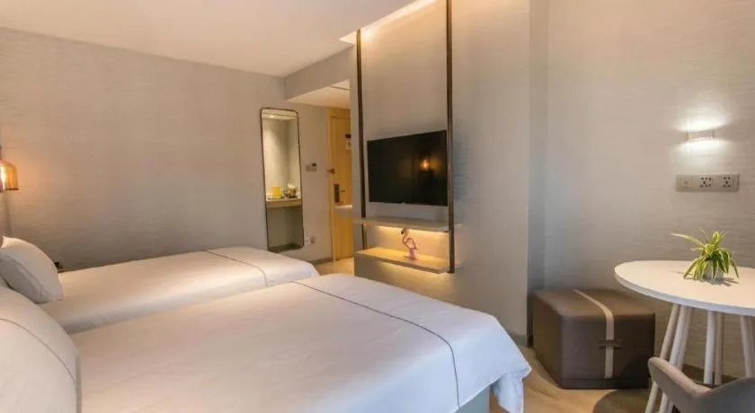 Bed in Magnotel Hotel Suzhou Shiquan Street Wangshiyuan