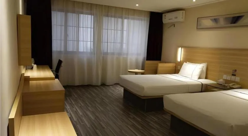 Bed in City Comfort Inn Wuhan Wangjiawan Yulong Road Metro Station