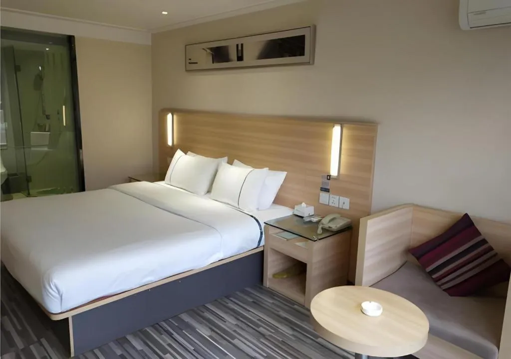 Bed in City Comfort Inn Wuhan Wangjiawan Yulong Road Metro Station