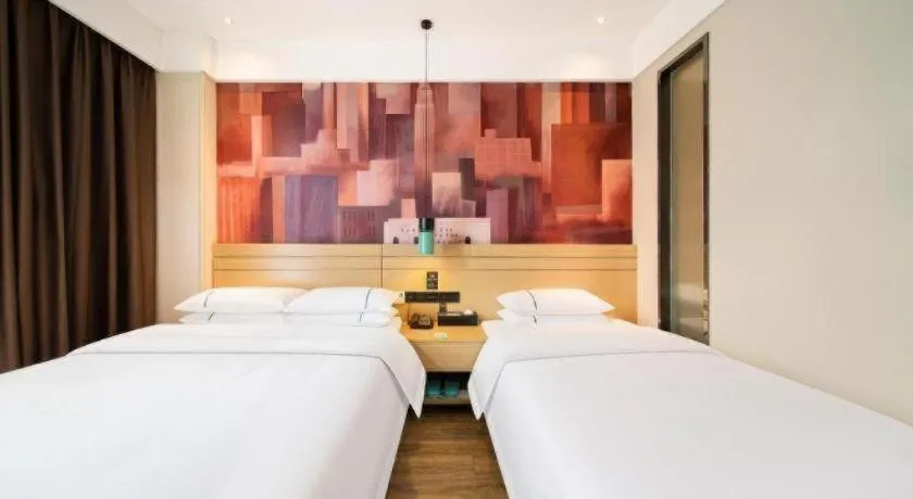 Bed in City Comfort Inn Wuhan Yuanlin Road Metro Station