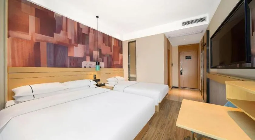 Bed in City Comfort Inn Wuhan Yuanlin Road Metro Station