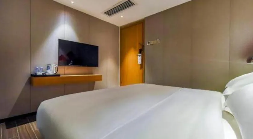 Bed in Borrman Hotel Guangzhou Quzhuang Metro Station