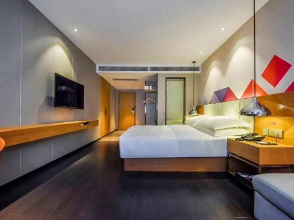 Bed in Borrman Hotel Guangzhou Quzhuang Metro Station