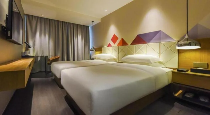 Bed in Borrman Hotel Guangzhou Quzhuang Metro Station