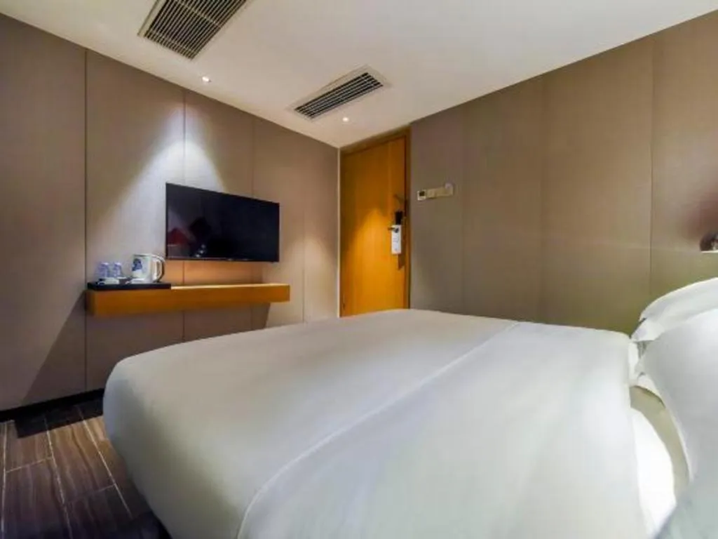 Bed in Borrman Hotel Guangzhou Quzhuang Metro Station