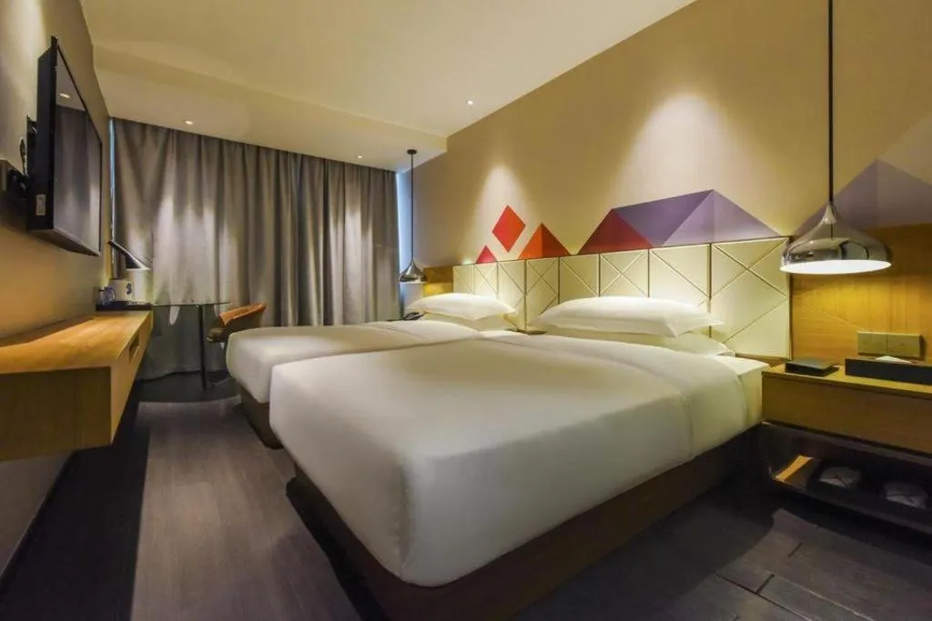 Bed in Borrman Hotel Guangzhou Quzhuang Metro Station