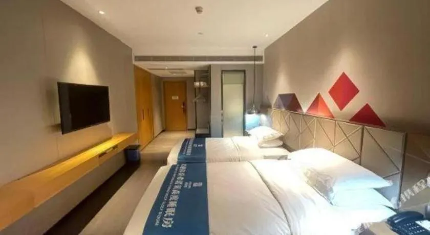 Bed in Borrman Hotel Guangzhou Quzhuang Metro Station