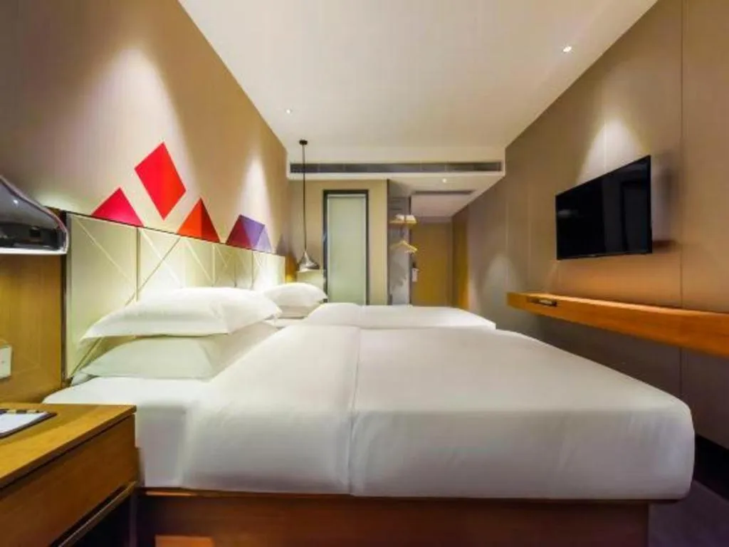 Bed in Borrman Hotel Guangzhou Quzhuang Metro Station
