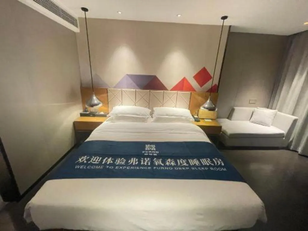Bed in Borrman Hotel Guangzhou Quzhuang Metro Station