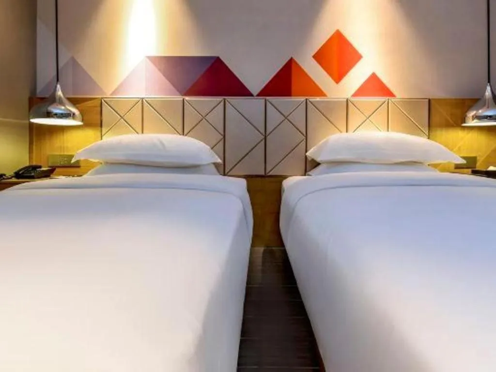 Bed in Borrman Hotel Guangzhou Quzhuang Metro Station